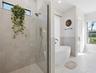 Primary bathroom, combination of modern freestanding tub and walk-in shower with tons of natural light