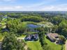 Sitting on 1.7 lakefront acres, tucked away in the heart of Land O Lakes