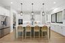 Huge Island (over 9 FT) and leathered granite countertop.
