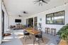 Pass through window from kitchen to rear porch for entertainment nad hosting.
