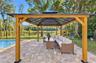Pergola by the pool for hang sessions and eating fully outdoors!