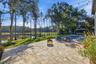 Huge paver deck. All pool equipment hidden with privacy fence.