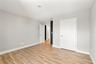 BEDROOM 5 W/ EN SUITE & WALK-IN MEDIA ROOM / CLOSET