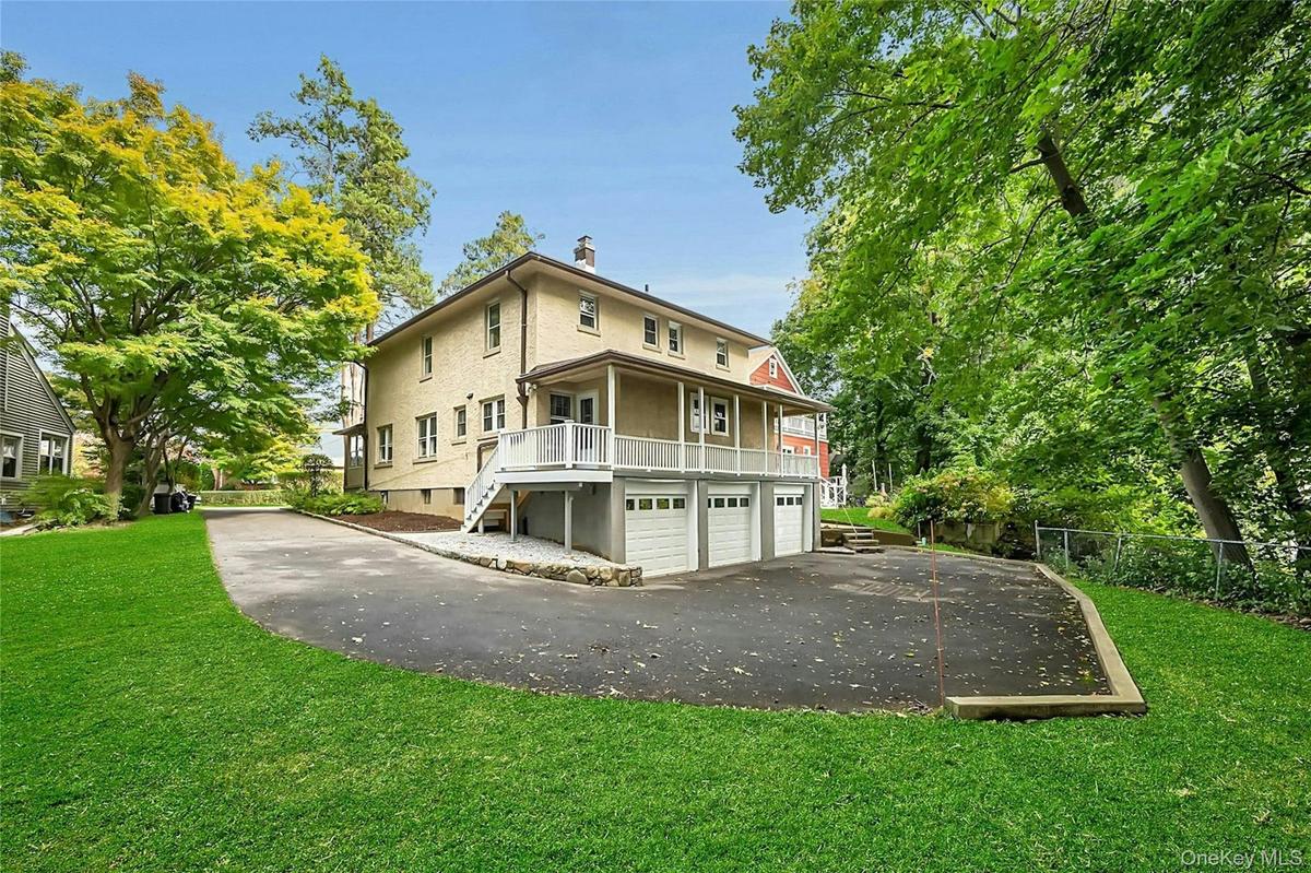 The two garages on the left are part of the 3-bed Duplex unit, with direct access to the basement with an interior staircase leading to the main-level