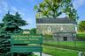 Adjacent to the cemetery, this 17th-century stone church is listed on the National Register of Historic Places
