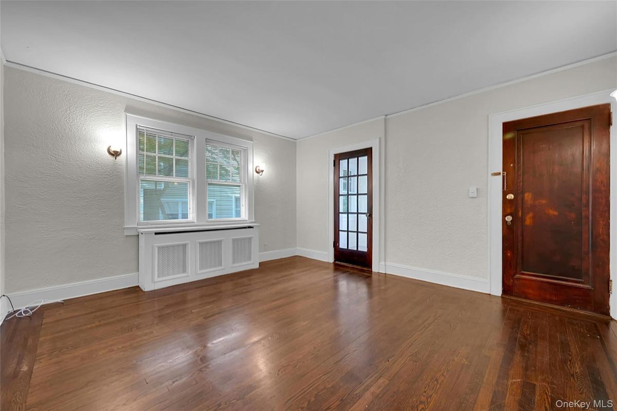 Front door on right, sunroom/office to left