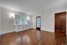 Front door on right, sunroom/office to left