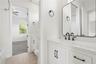 Bathroom 4 is a shared ensuite between bedrooms 3 & 4, each side has their own vanity area, and the bath/shower and toilet are shared.