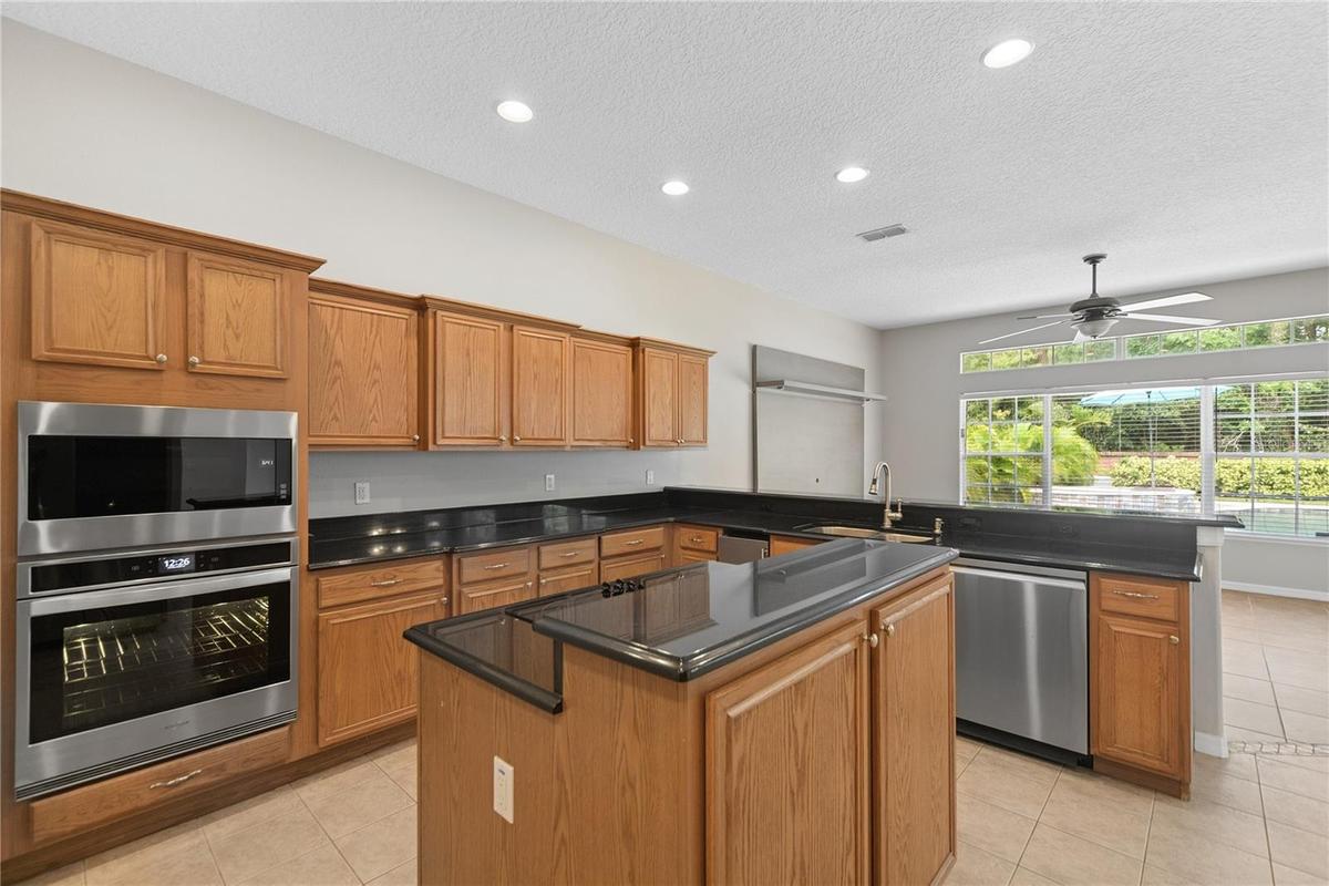 Here you can see the newer oven and microwave and the new dishwasher.