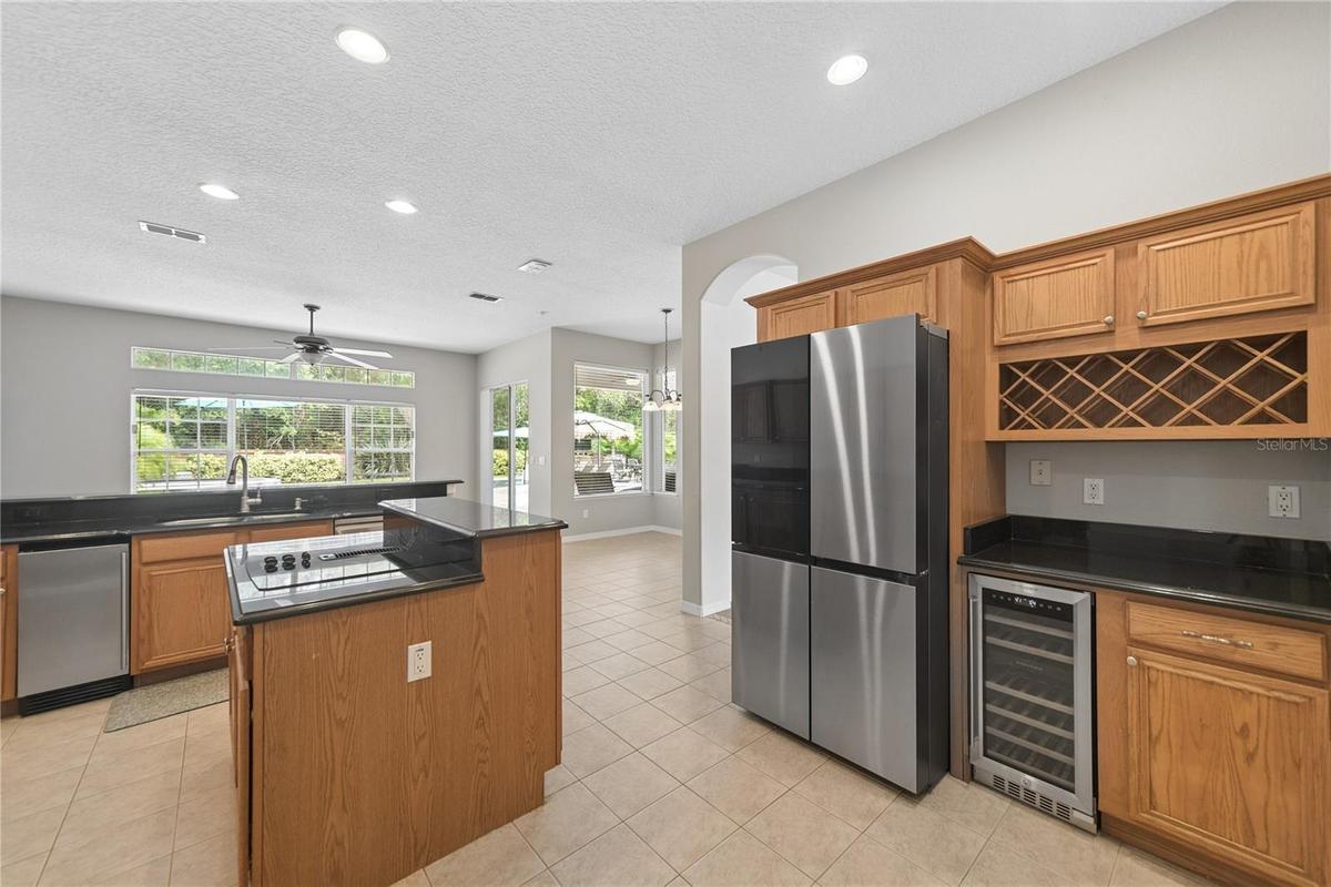 Here you can see the new ice maker next to the sink, along with the new Samsung 4 door refrigerator and wine fridge.