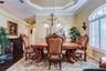 Dining room with Tray ceiling and crown molding