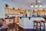 Kitchen with wood cabinets and higher end appliances