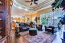 Great room is OPEN to the kitchen with sliding doors to the Lanai boasting Expansive Golf Course views