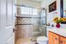 Back bath ensuite on same wing with door to access pool