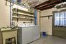 basement sep room leads to mudroom to rear walk out access