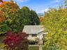 Front view of the home showcasing its charming exterior and beautiful Hudson River views.