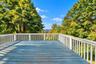 Spacious deck overlooking the beautiful Hudson River, perfect for entertaining guests, enjoying your morning coffee, or unwinding while taking in the 