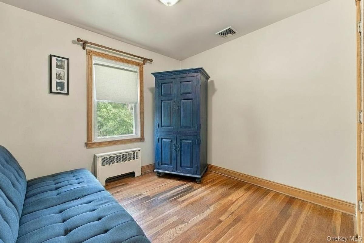 Third bedroom with hardwood floors