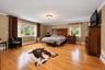 Wood-finish flooring, multi-pane windows, and crown molding