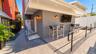 The covered patio offers a versatile outdoor space with convenient access to both the restaurant and private party room. Perfect for entertaining, hos