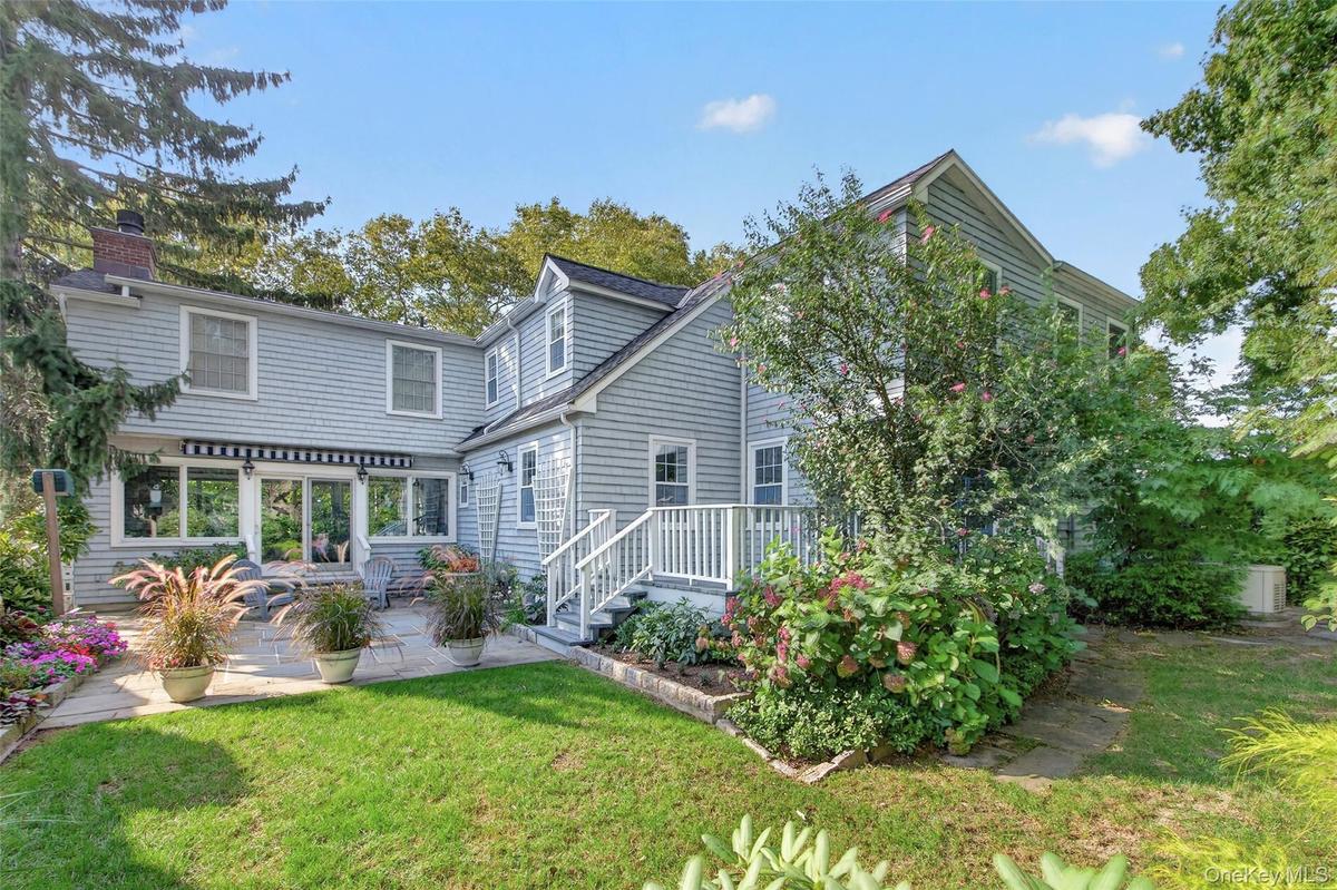 Vew From Rear Yard to Patio and Deck