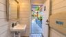 Powder room with easy access from the patio.