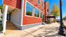 Another view of 43 North Riverside Avenue showcases the building’s convenient layout, featuring a private front entrance for the residential apartment