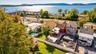 The sky’s the limit with this incredible investment opportunity! With an established restaurant, multiple rental apartments, and versatile commercial 