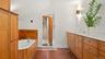 Primary bedroom en suite bath with soaking tub, shower and sauna.