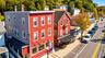This turnkey property offers an exceptional investment opportunity, featuring two buildings, each with two-bedroom rental apartments, an established r