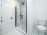 1st Floor: Primary bathroom with stall shower