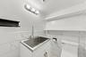 Located off the laundry room