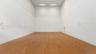 Racquet ball court in barn