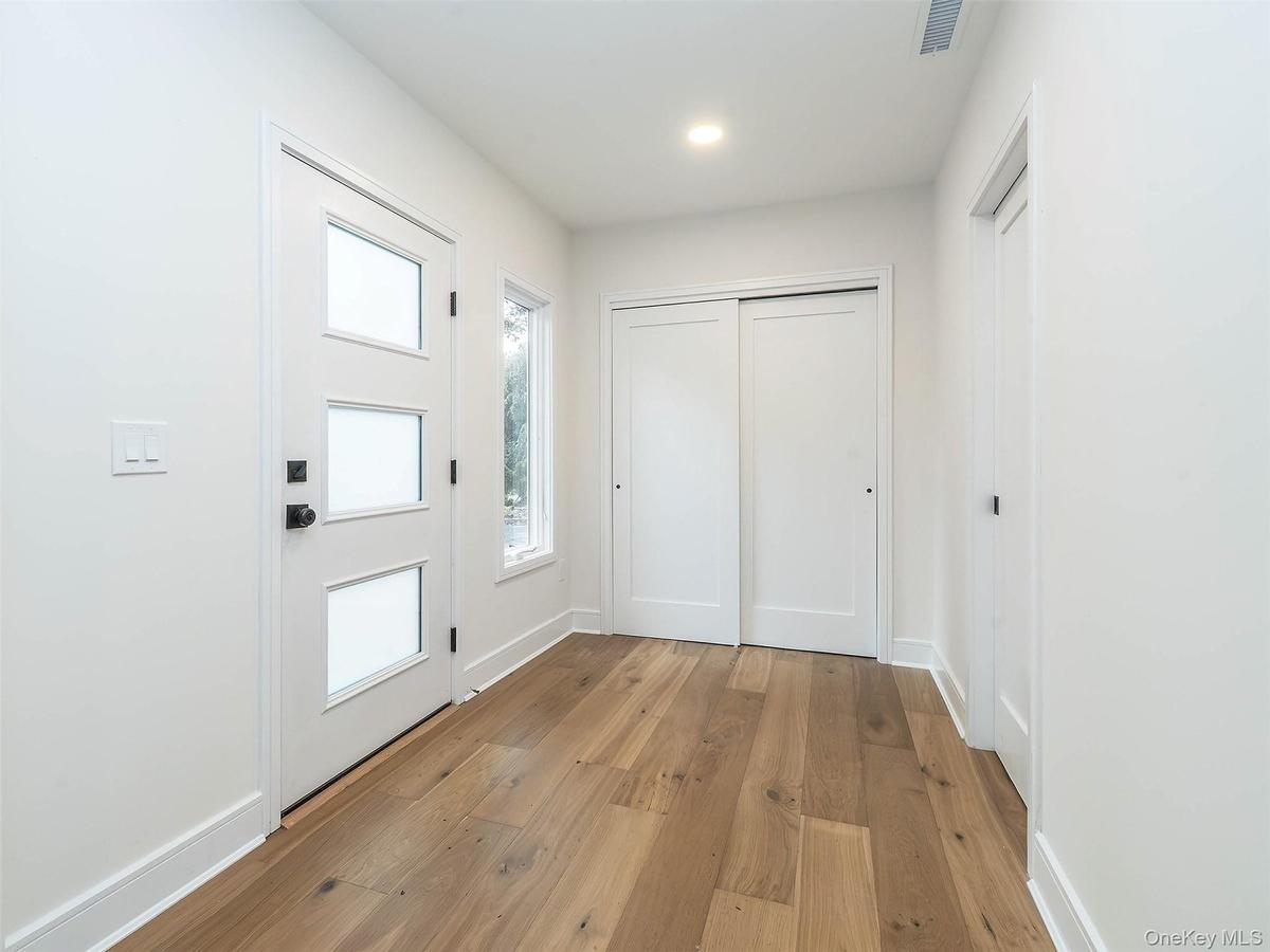 Entry way with large coat closet