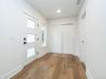 Entry way with large coat closet