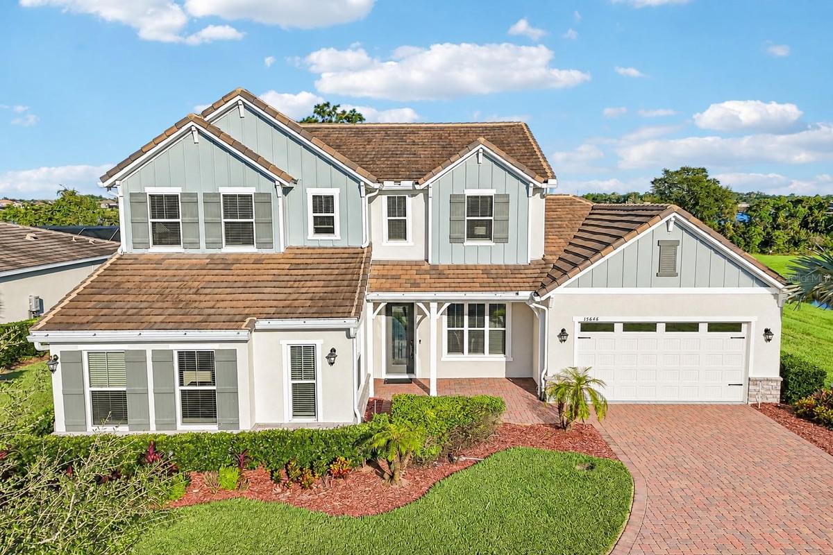 BUILT IN 2021, this beautifully upgraded 5-bedroom, 3.5-bath home sits on an OVERSIZED .37 ACRE CUL-DE-SAC LOT overlooking LAKE HUCKLEBERRY in the Hig