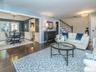 Living room opens up into the formal dining area