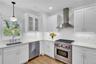 Brand new Eik with Wolf Professional Stove,Stainless Steel Appliances, wine cooler, Farmhouse pendants, Hi-hats, wood floors....