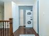 Stackable laundry hallway on second floor