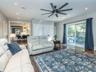 Family room/ Den with several closets and a half bath