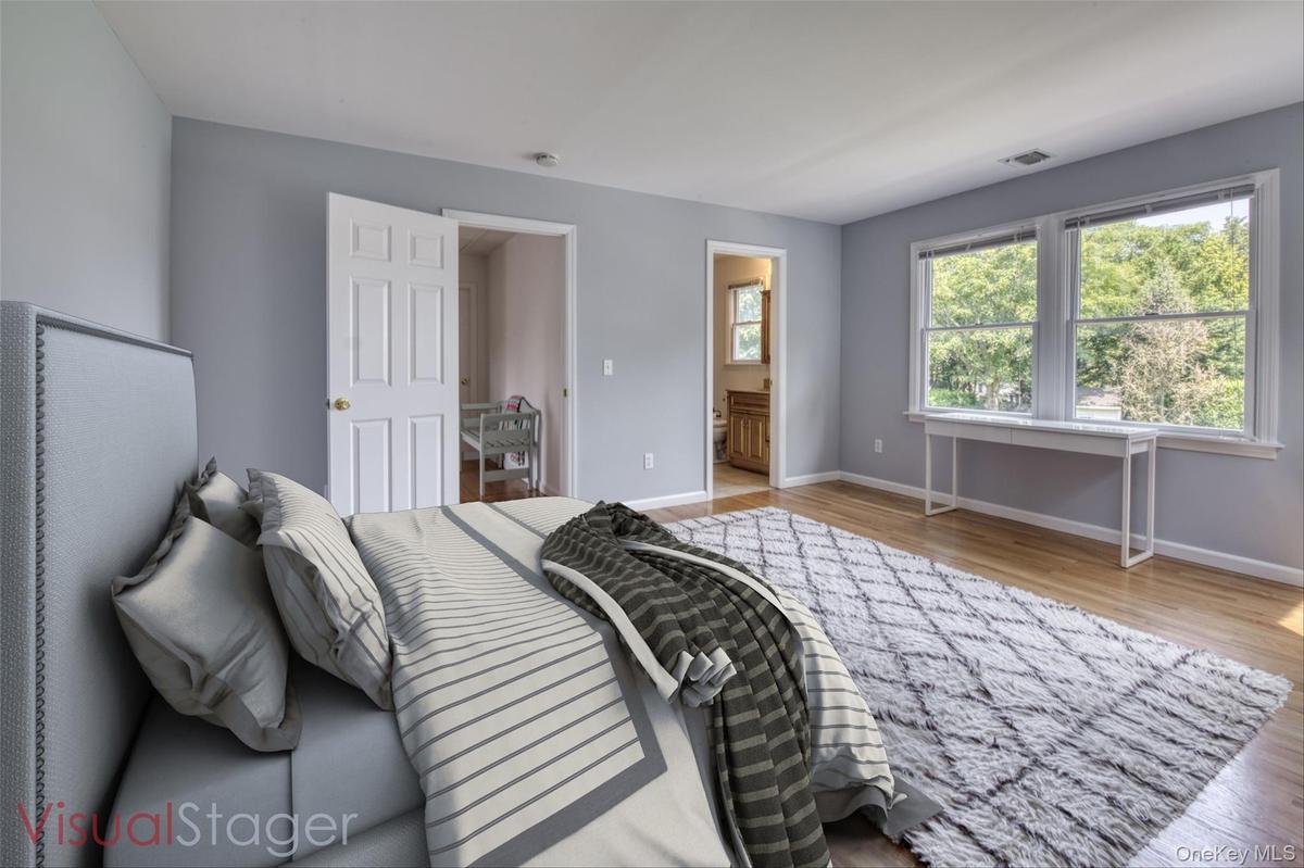 primary bedroom with full bath