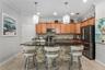 Kitchen with large island and beautiful lighting