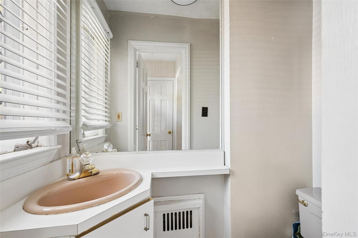 Half bathroom at entrance