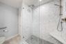 Exquisite shower in primary En suite bath is an oasis in itself.