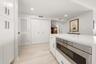 Built in microwave in kitchen island to efficiently free up cabinet & counter space.