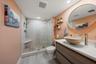 Guest bath has beautifully been renovated & features gorgeous step in shower
