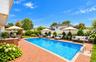 Digitally enhanced with added patio furniture