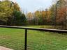 step out of main living space to your wraparound deck and inhale deeply