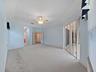 Primary Bedroom ~ Doors Open to Lanai