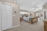 Entrance to huge primary bedroom with a seating area